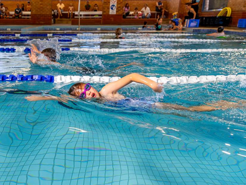 Girl swimming on pool